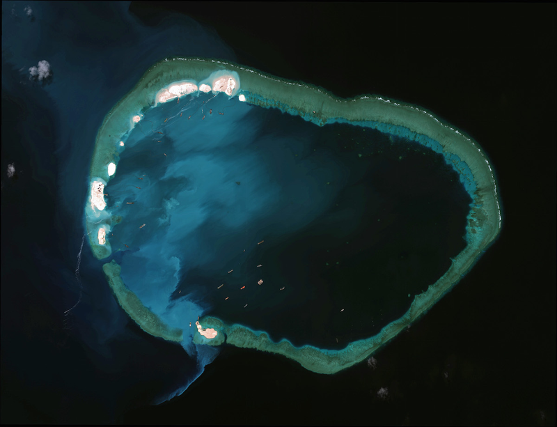 Illustration for article titled Incredible Satellite Images Show China Building Artificial Archipelago
